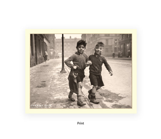 Sepia photographic print of two young boys walking in the Gorbals, Glasgow, 1948, street scene with tenement buildings